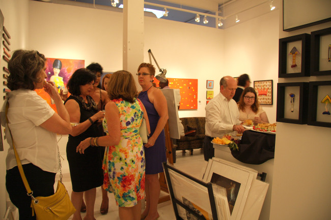 Friends and fans mingle at The Ginger Fox Gallery during the book signing photo